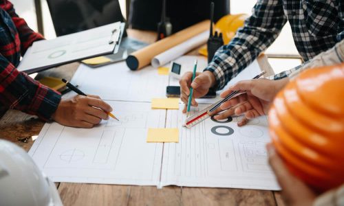 engineer-teams-meeting-working-together-wear-worker-helmets-hardhat-construction-site-modern-city (1)