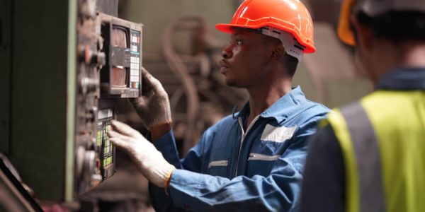 portrait-professional-heavy-industry-engineer-worker-wearing-safety-uniform-goggles-hard-hat-background-unfocused-large-industrial-factory (1)