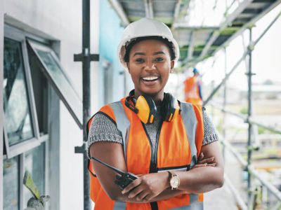 youll-want-invest-this-new-development-portrait-young-woman-working-construction-site (1)